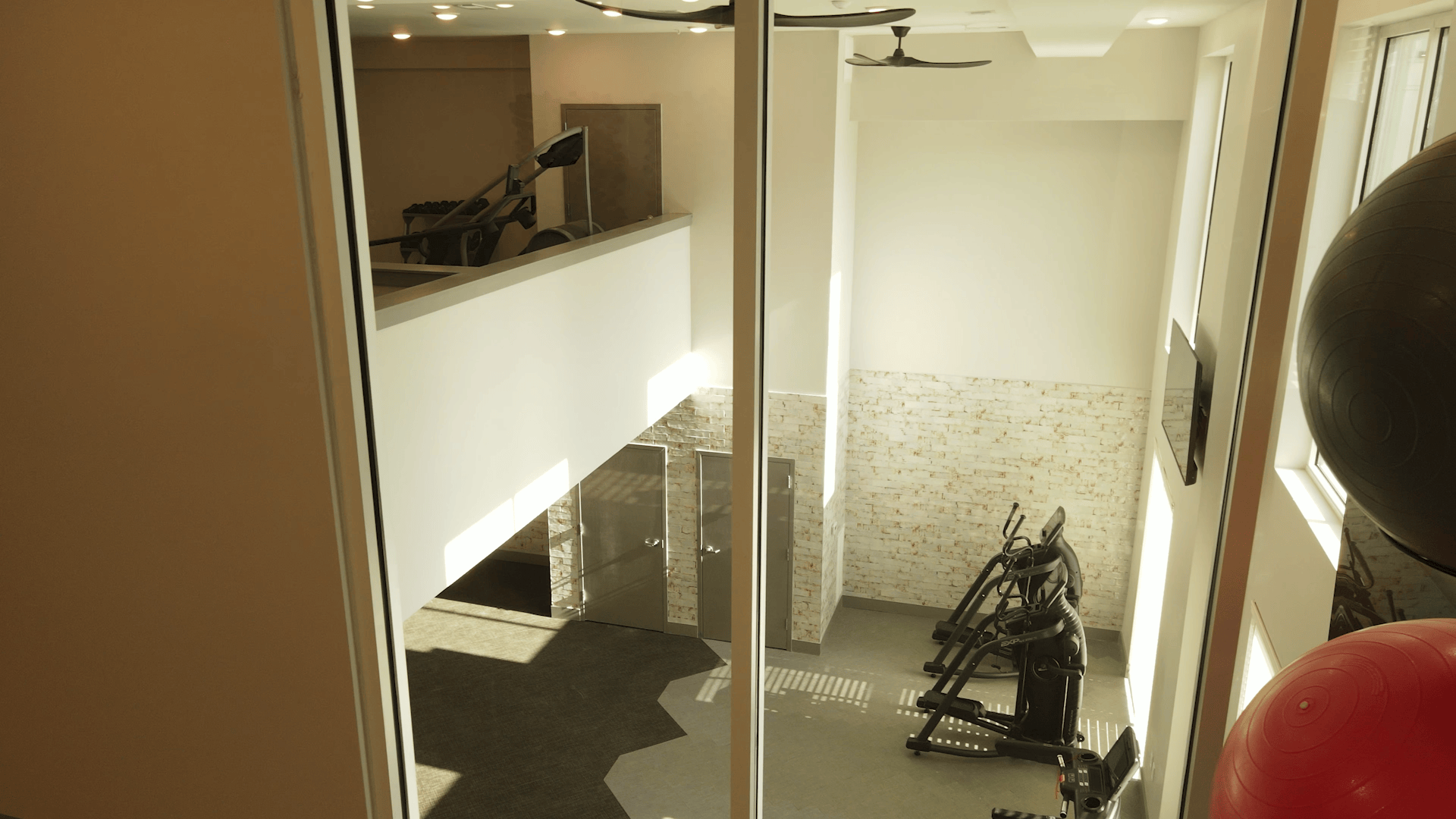 View from Yoga Studio, looking into multi level fitness center