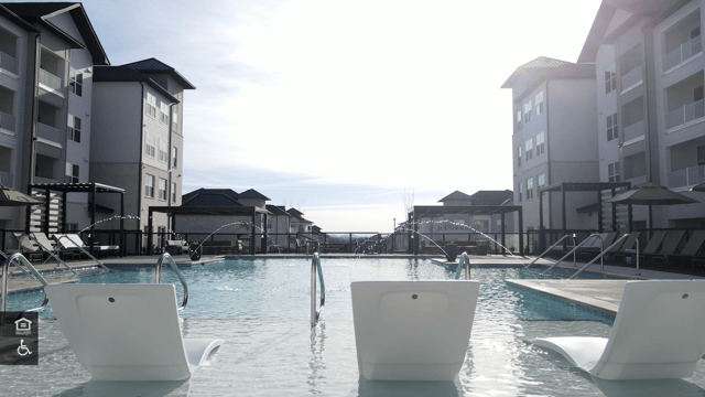 Looking over the salt water pool and in-pool lounge chairs
