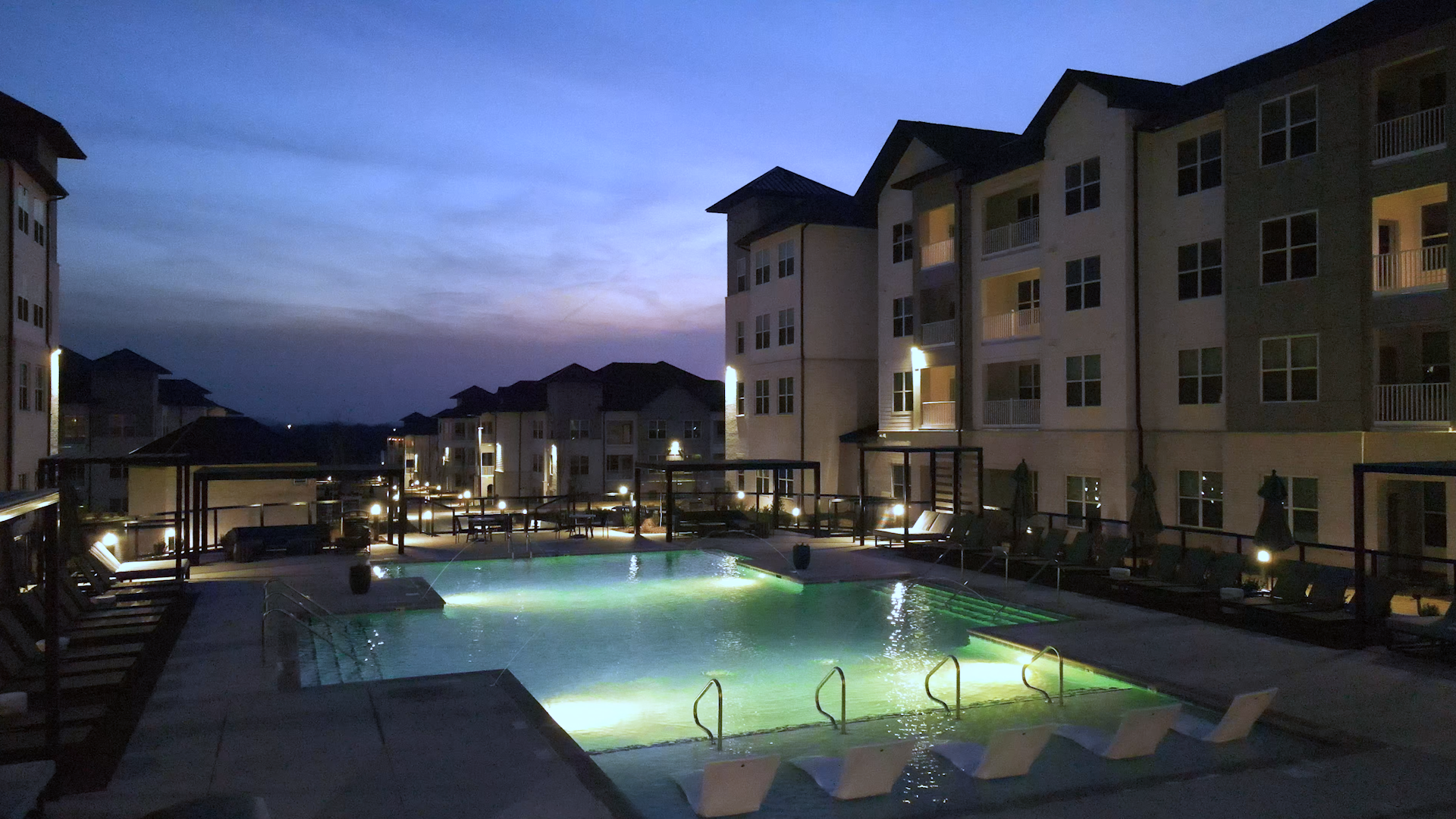 Twilight at the Ravelle, looking over the pool and grand courtyard Twilight at the Ravelle, looking over the pool and grand courtyard