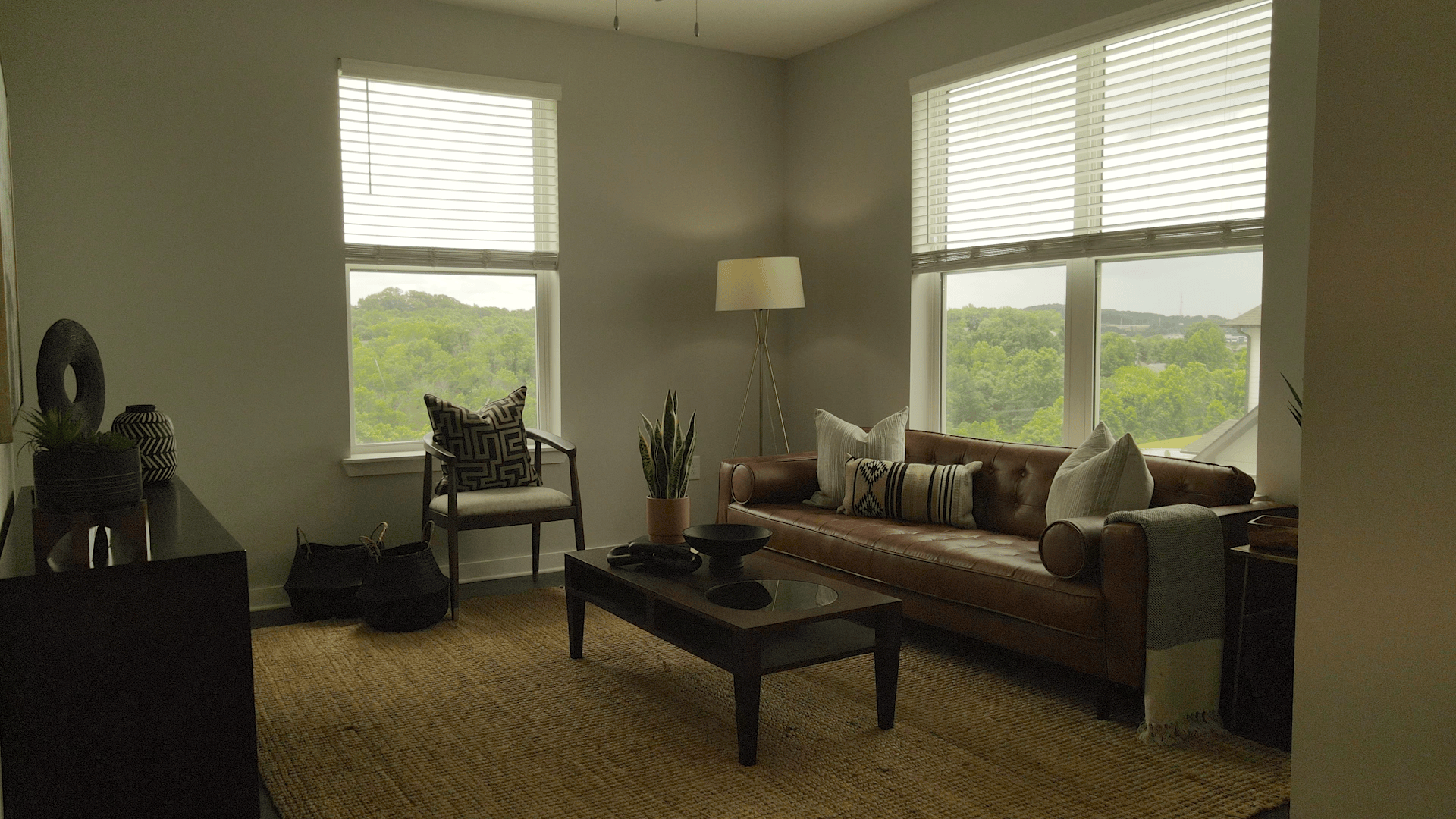 Picture of living area / den in Perspective Floor Plan. The large windows look out to the rolling hillside that surrounds the Ravelle apartment community in the southeast Nashville neighborhood of Antioch, Tennessee. Picture of living area / den in Perspective Floor Plan. The large windows look out to the rolling hillside that surrounds the Ravelle apartment community in the southeast Nashville neighborhood of Antioch, Tennessee.