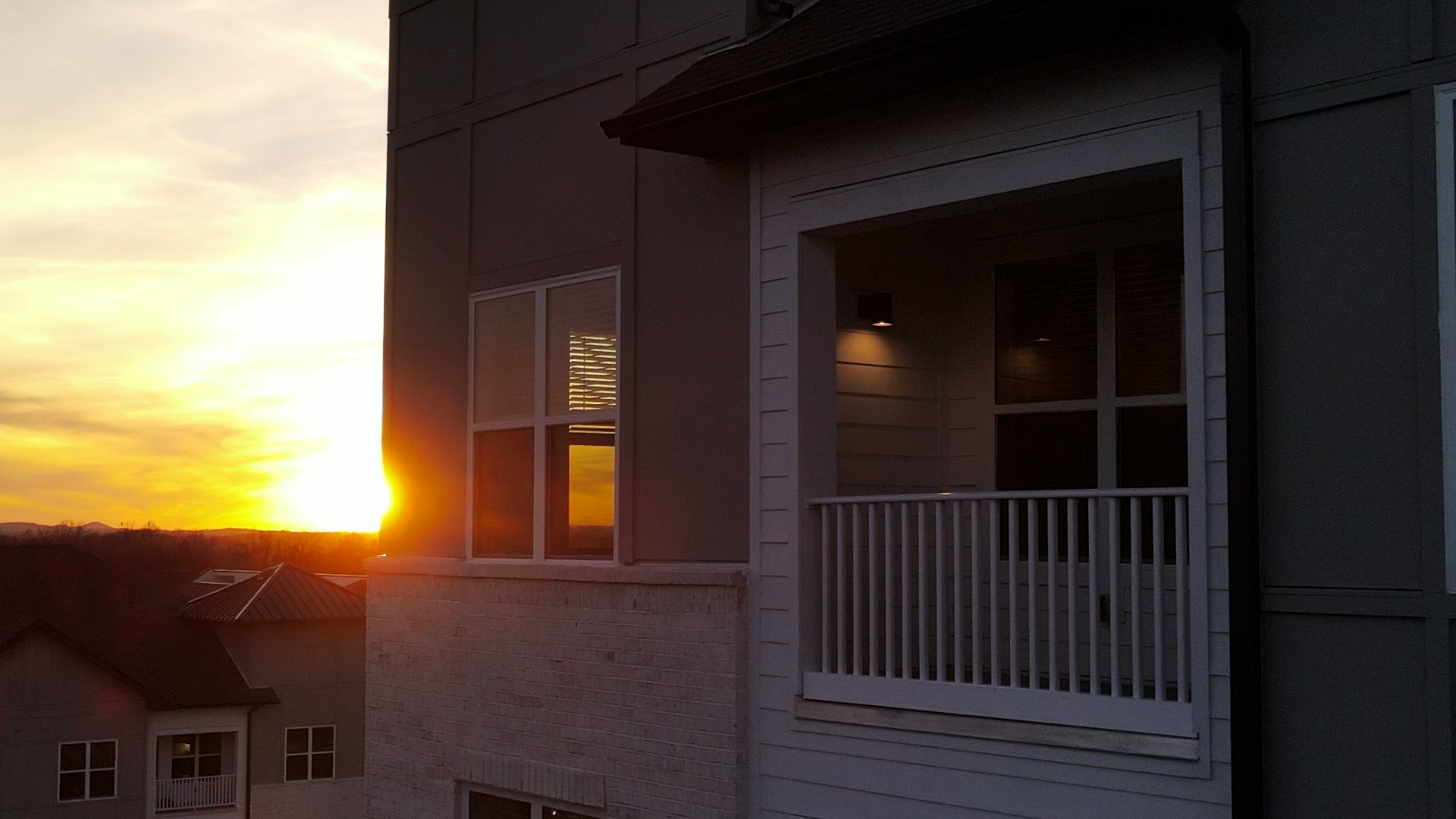 Sunset over Balcony of Apartment Home at The Ravelle in Nashville, Tennessee