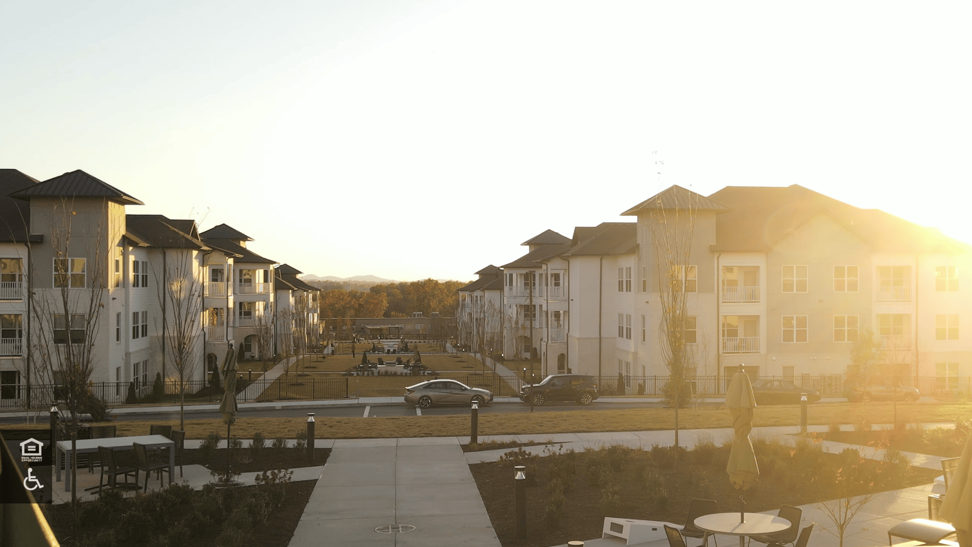 Sun setting over the grand courtyard at The Ravella apartment community in Nashville, Tennessee Sun setting over the grand courtyard at The Ravella apartment community in Nashville, Tennessee