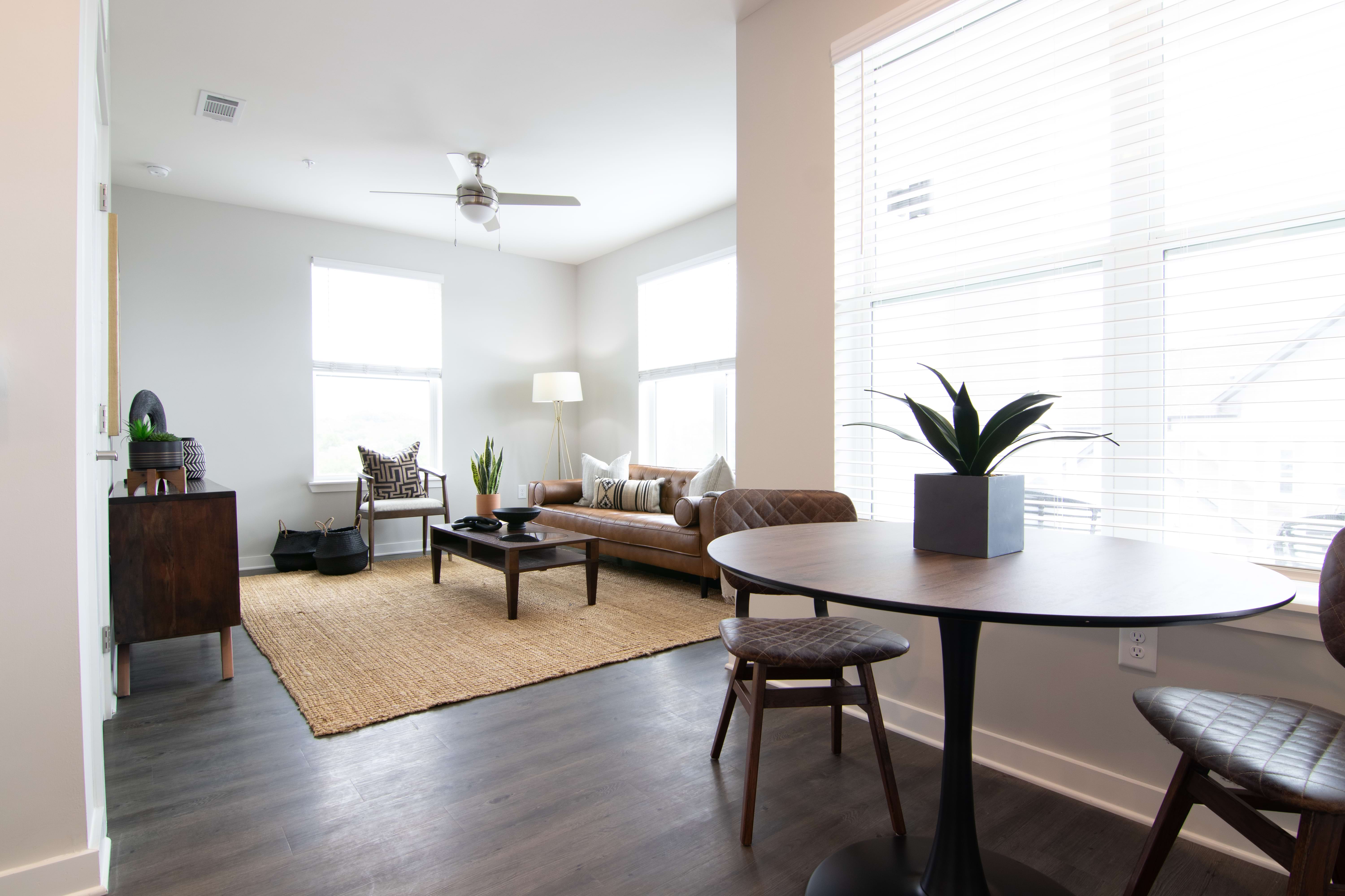 Open concept dining and living areas in 2B/2B Perspective Apartment Home