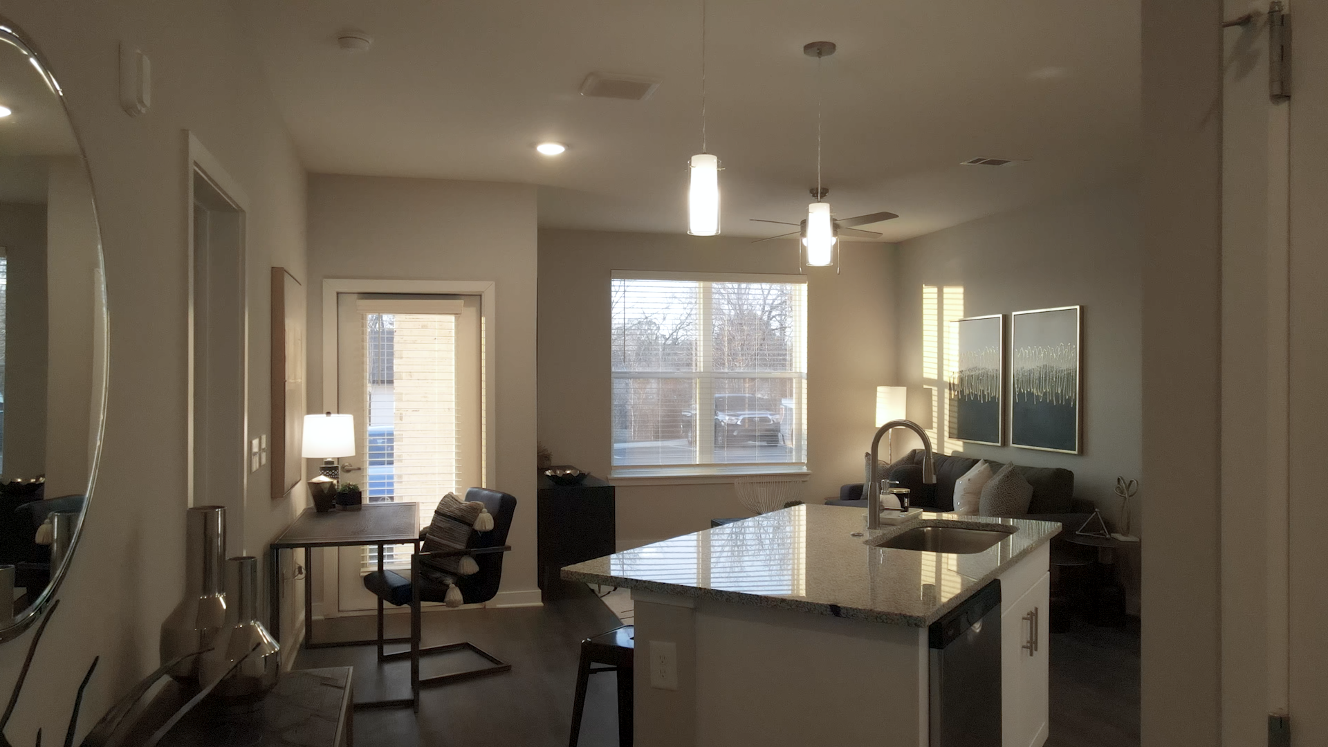 Wide view of open concept kitchen and living are in SCENE floor plan at the Ravelle in Nashville, TN. Wide view of open concept kitchen and living are in SCENE floor plan at the Ravelle in Nashville, TN.