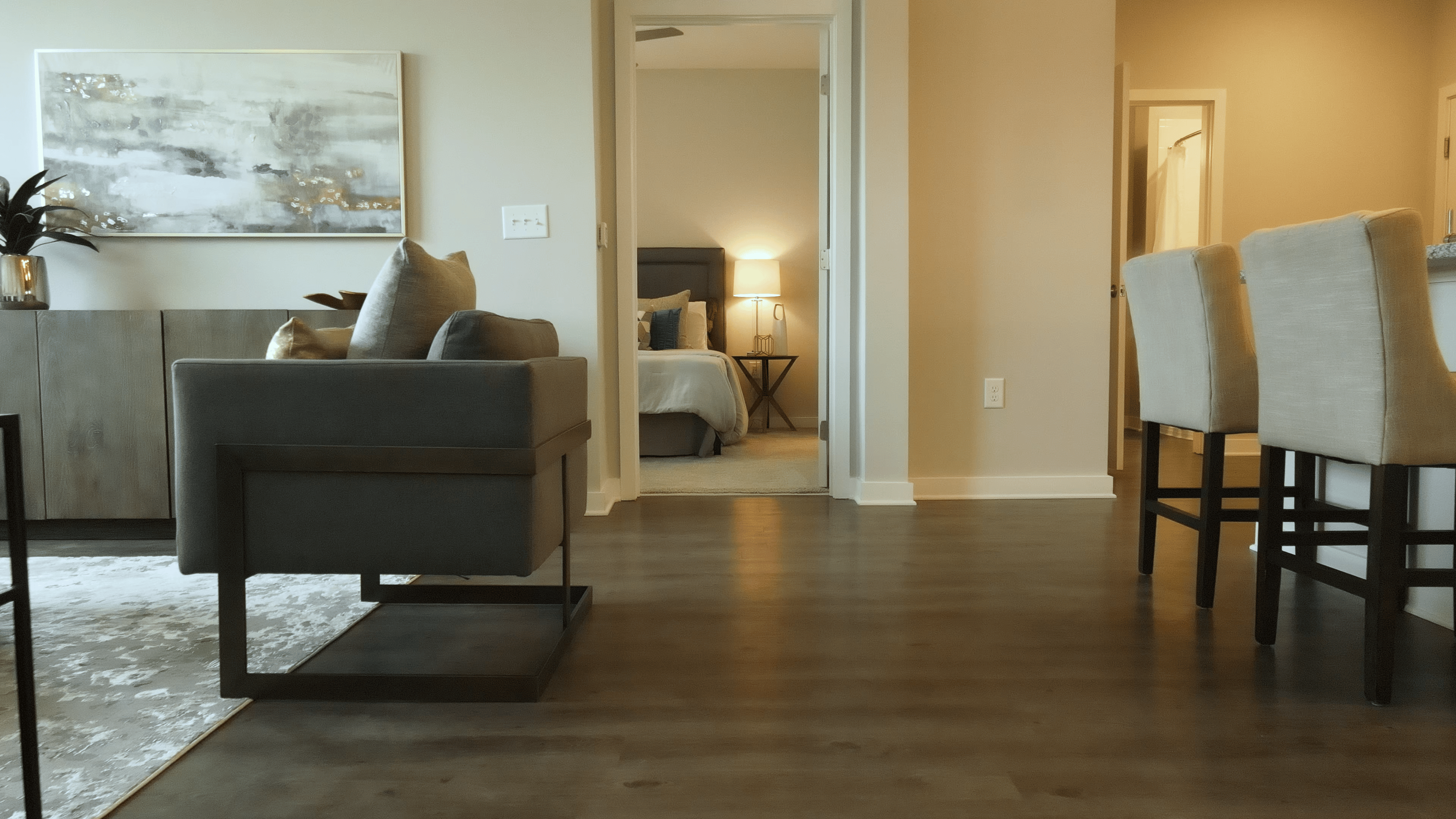 Modern bedroom at The Ravelle at Ridgeview apartments in Antioch.