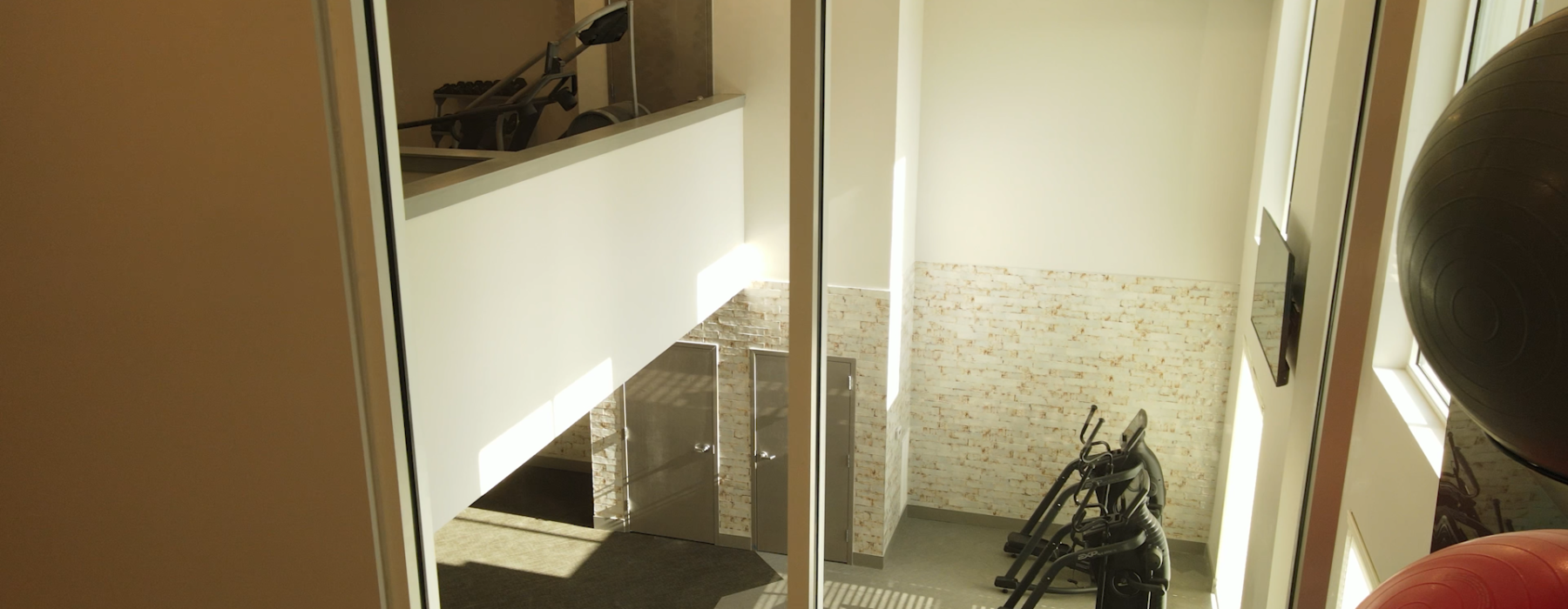 View from Yoga Studio, looking into multi level fitness center