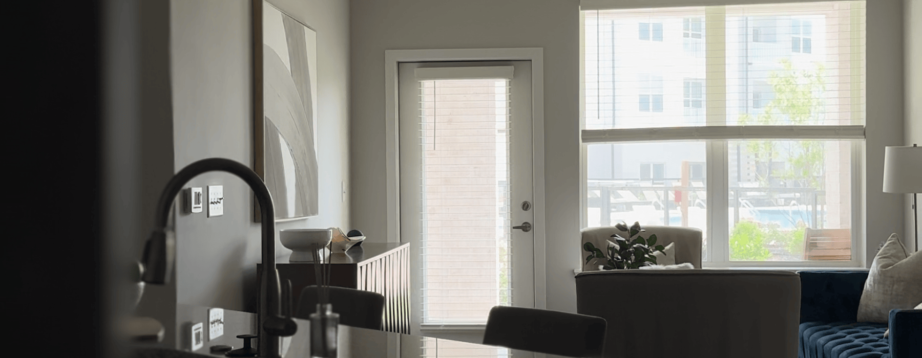 Living space with large windows in Horizon one bedroom apartment in Antioch, Tennessee