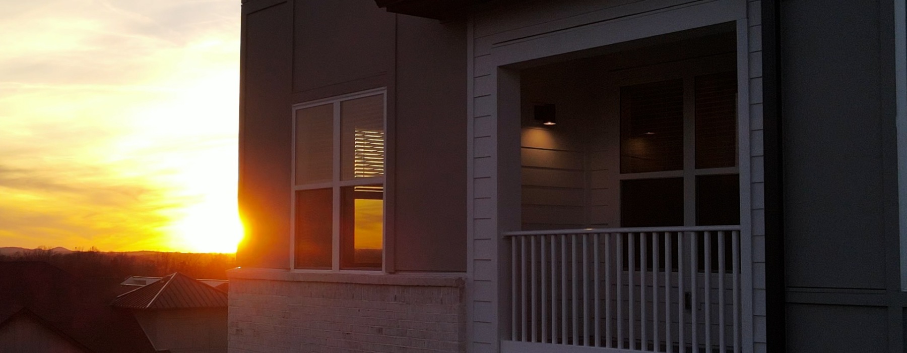 Sunset over Balcony of Apartment Home at The Ravelle in Nashville, Tennessee