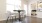 Dining Area with two chairs around a table and the door to the second bedroom.