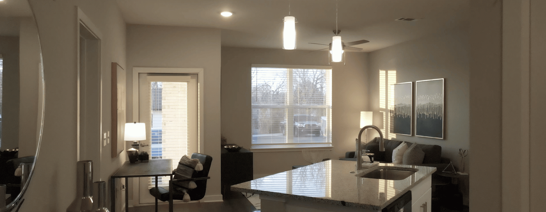 Wide view of open concept kitchen and living are in SCENE floor plan at the Ravelle in Nashville, TN.